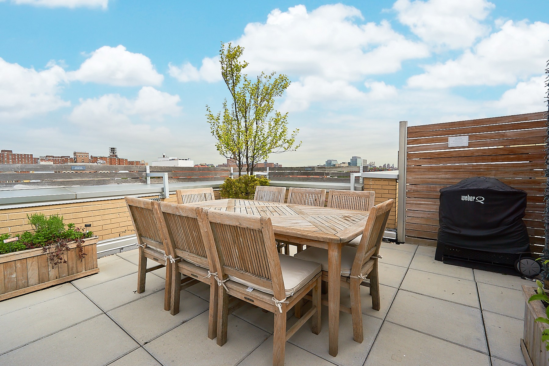 2280 Frederick Douglass Boulevard, Unit 5D Manhattan, NY 10027 - Photo 17 of 22 a view of a terrace with furniture and stove