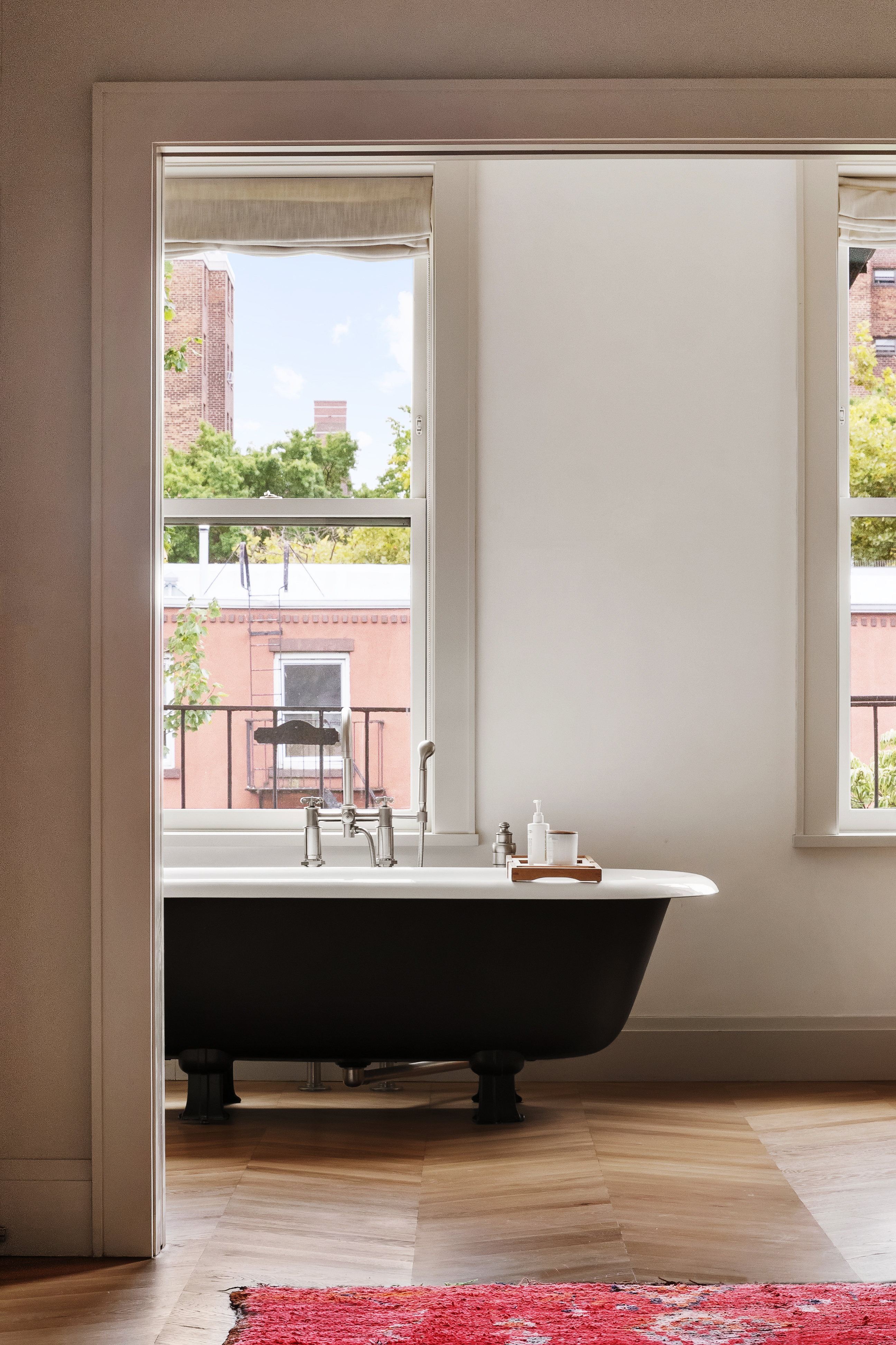 168 Bergen Street Brooklyn, NY 11217 - Photo 14 of 25 a room with a window a sink and a mirror