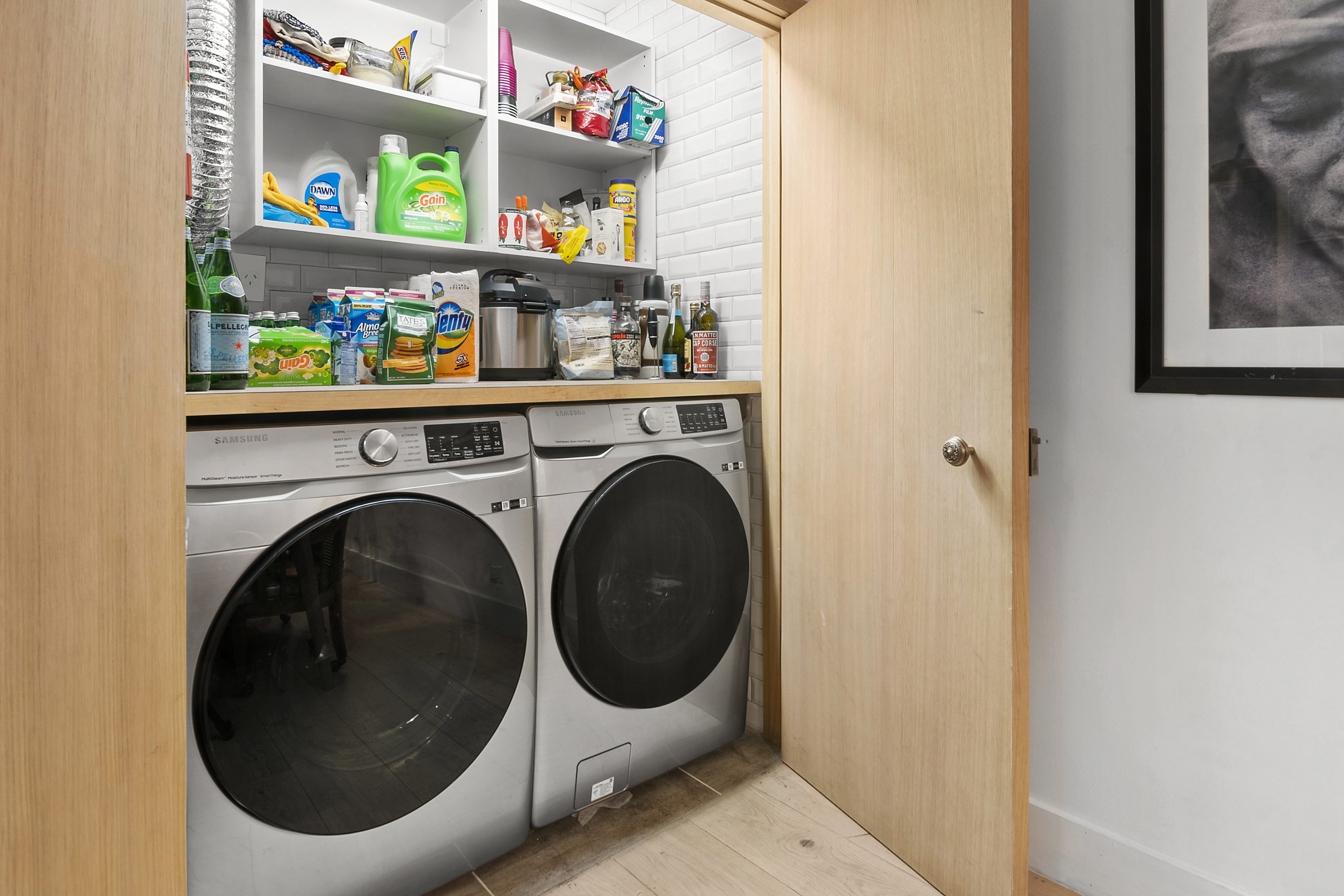 87 Monroe Street Brooklyn, NY 11216 - Photo 18 of 26 a utility room with dryer and washer