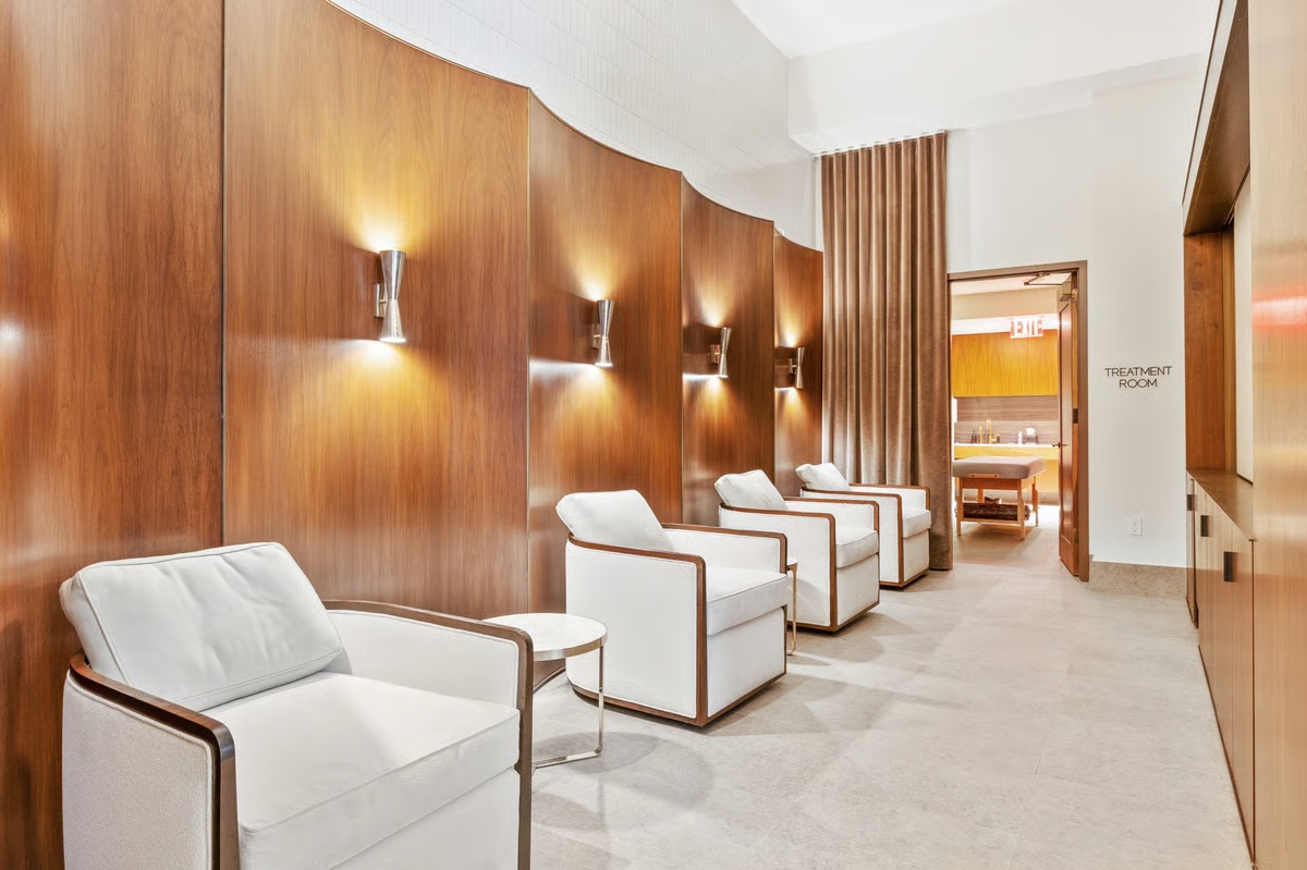 301 East 50th Street, Unit 5A Manhattan, NY 10022 - Photo 15 of 19 a living room with furniture and a large window