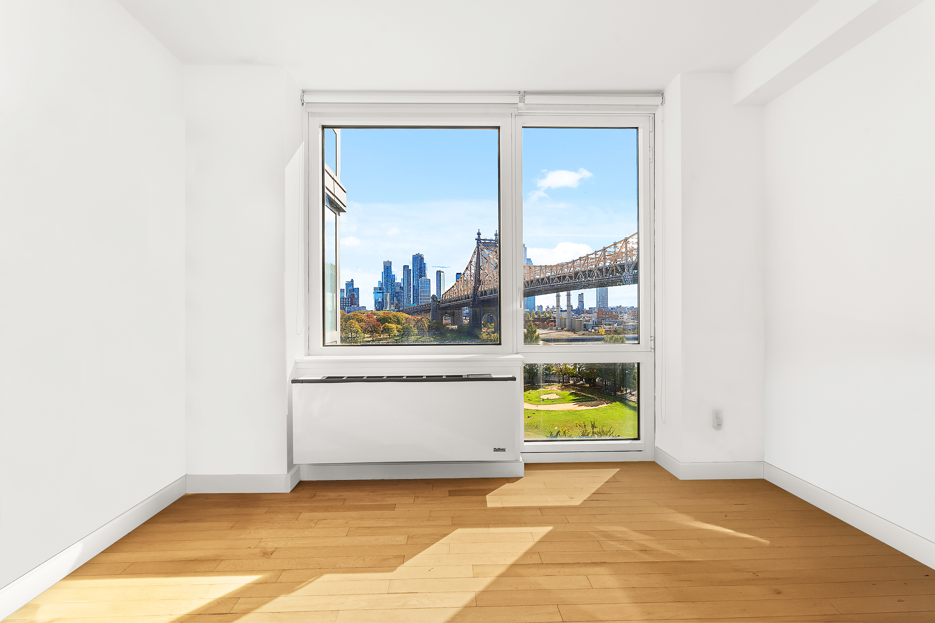 415 Main Street, Unit 7C Manhattan, NY 10044 - Photo 4 of 16 a view of room with window and bathroom
