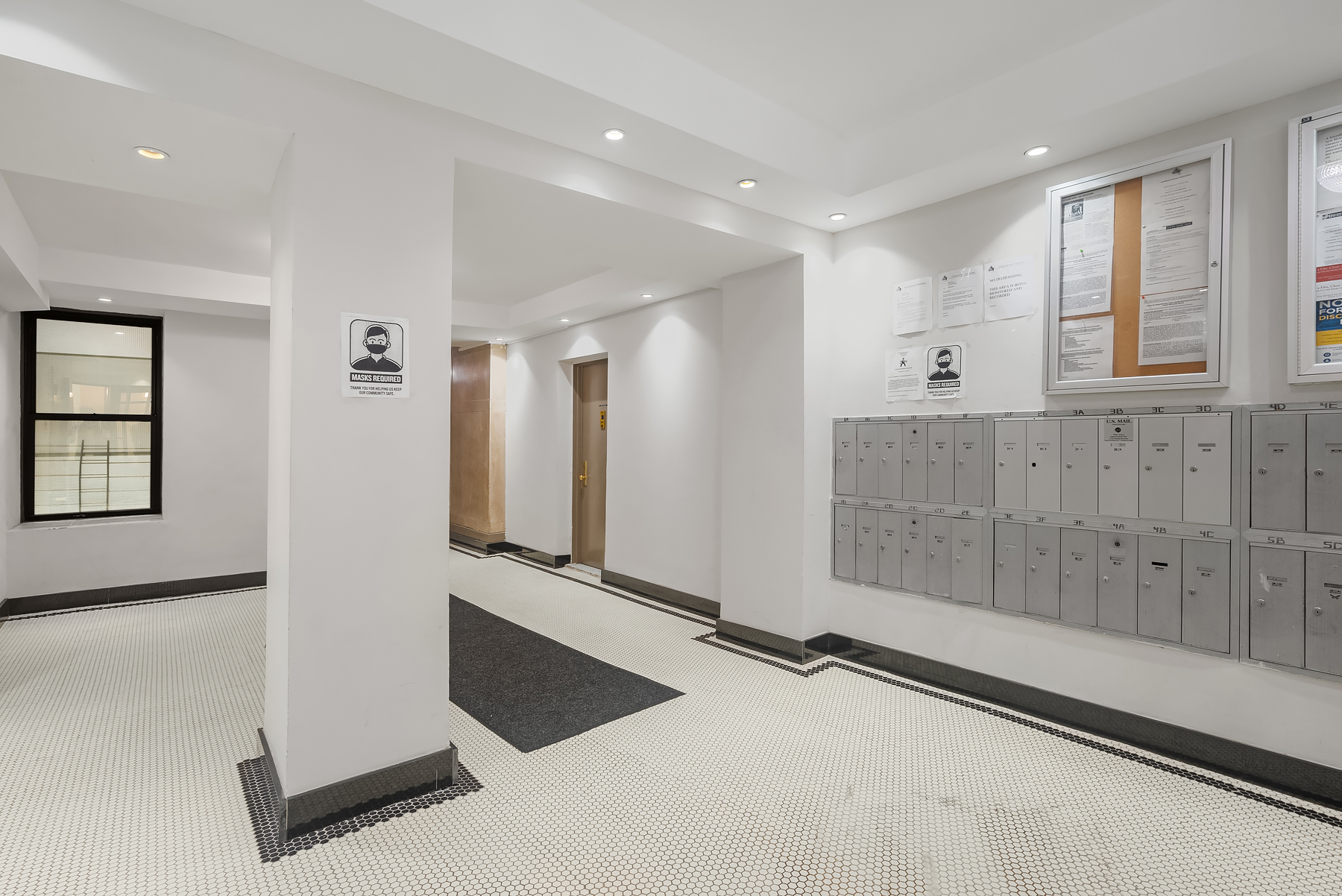 750 Riverside Drive, Unit 6B Manhattan, NY 10031 - Photo 6 of 8 a view of a hallway with windows
