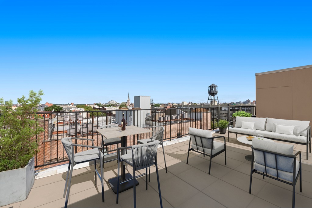 122 West Street, Unit PHA Brooklyn, NY 11222 - Photo 4 of 14 a view of a terrace with furniture and a potted plant