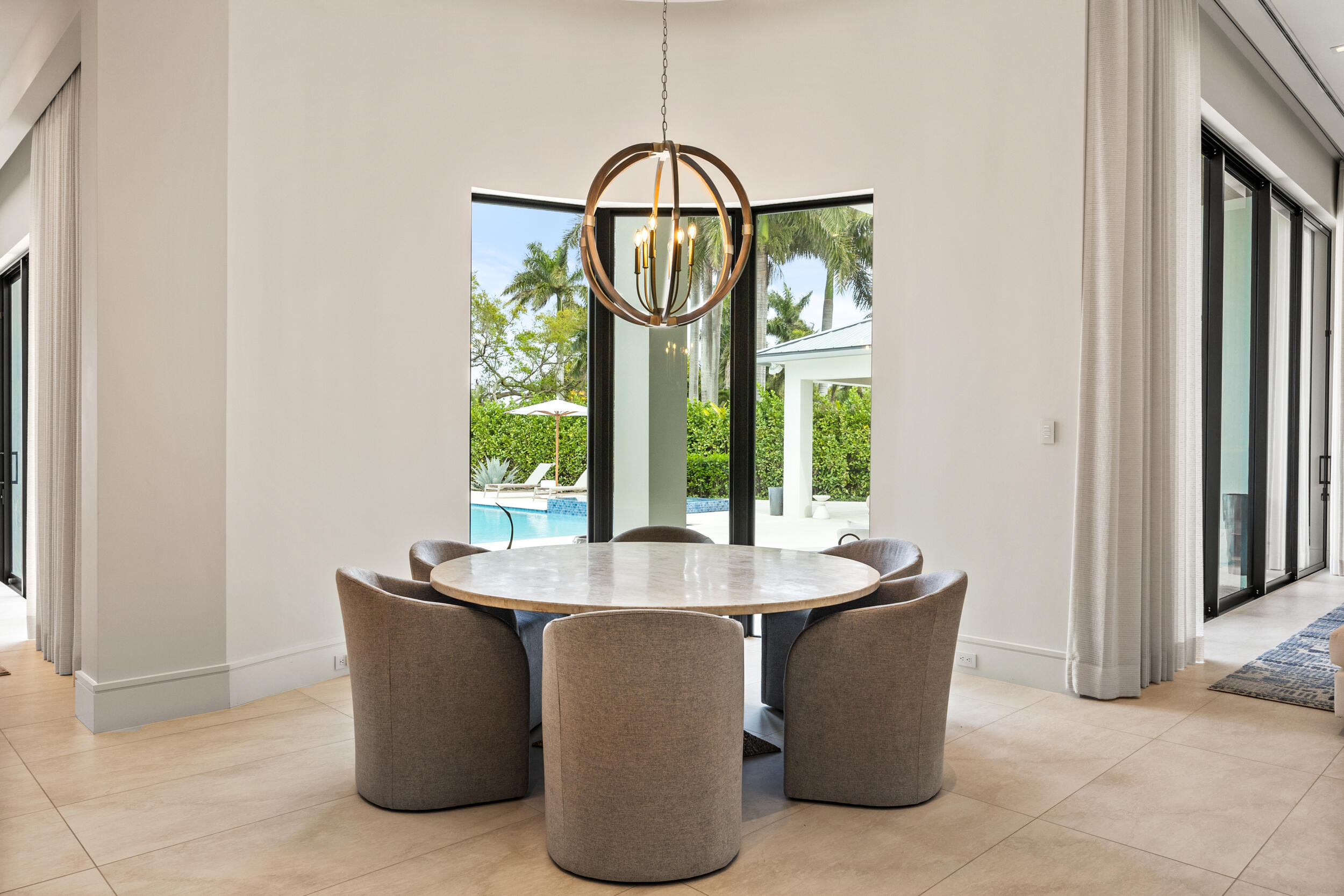 5695 Pennock Point Road Jupiter, FL 33458 - Photo 35 of 77 a dining room with kitchen island granite countertop furniture and a window