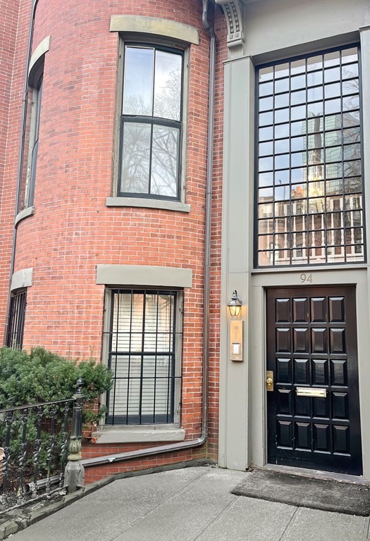 94 Appleton Street, Unit 4 Boston, MA 02116 - Photo 1 of 1 a front view of a house with a large window