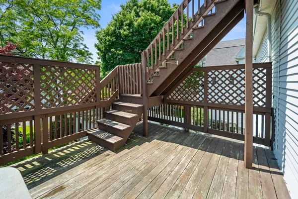 a view of balcony with wooden floor