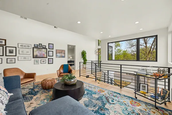 a living room with furniture and a table
