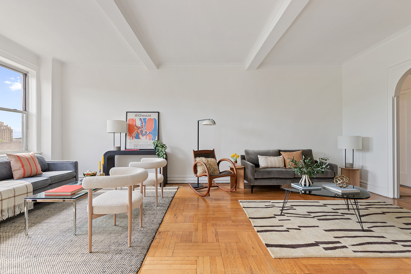 41 Eastern Parkway, Unit 8B Brooklyn, NY 11238 - Photo 2 of 13 a living room with furniture and a rug