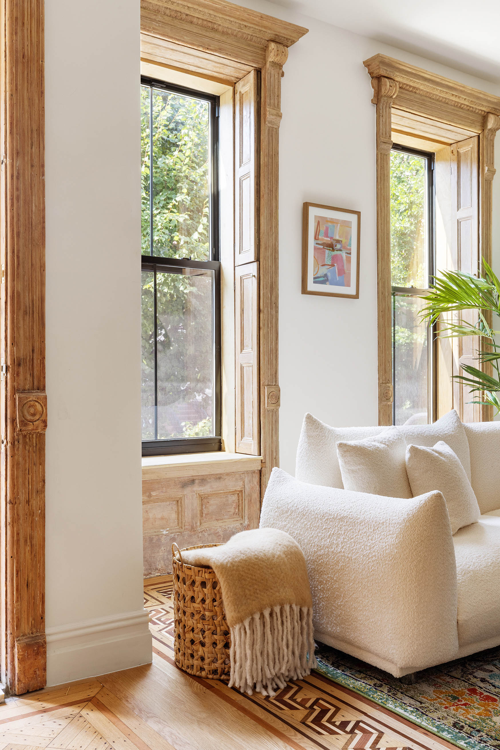 647 Macon Street Brooklyn, NY 11233 - Photo 4 of 20 a bedroom with a bed and wooden floor