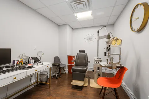 a room with furniture and a flat screen tv