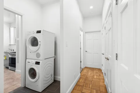 a view of living room washer and dryer