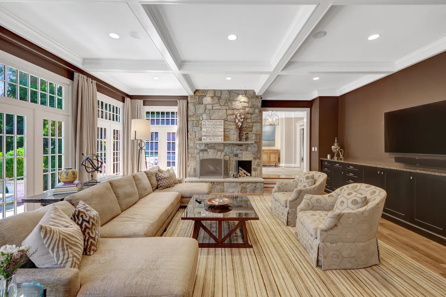 a kitchen with stainless steel appliances granite countertop a sink stove and cabinets