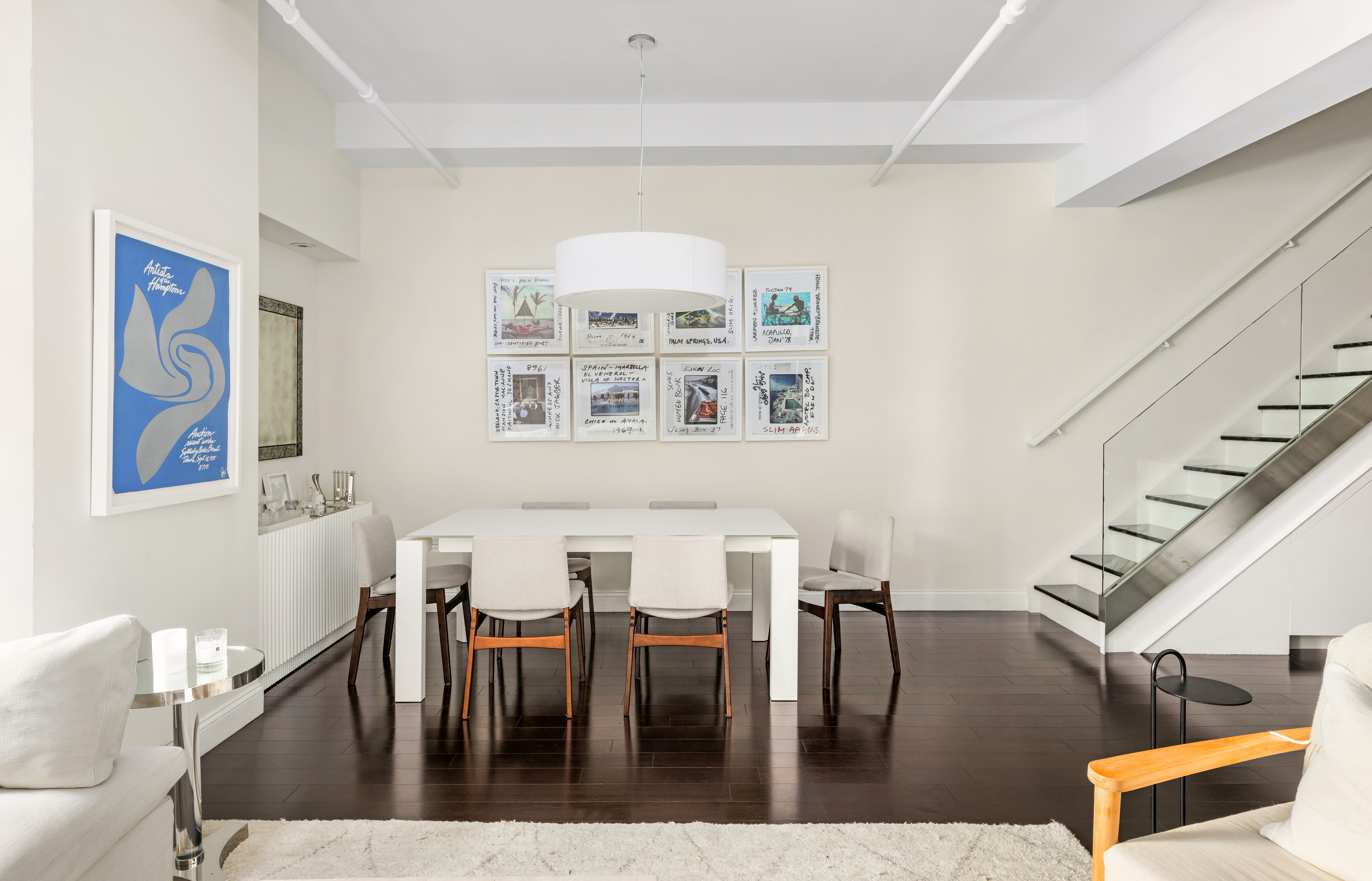 14 East 4th Street, Unit 803 Manhattan, NY 10012 - Photo 3 of 11 a view of a dining room with furniture and wooden floor