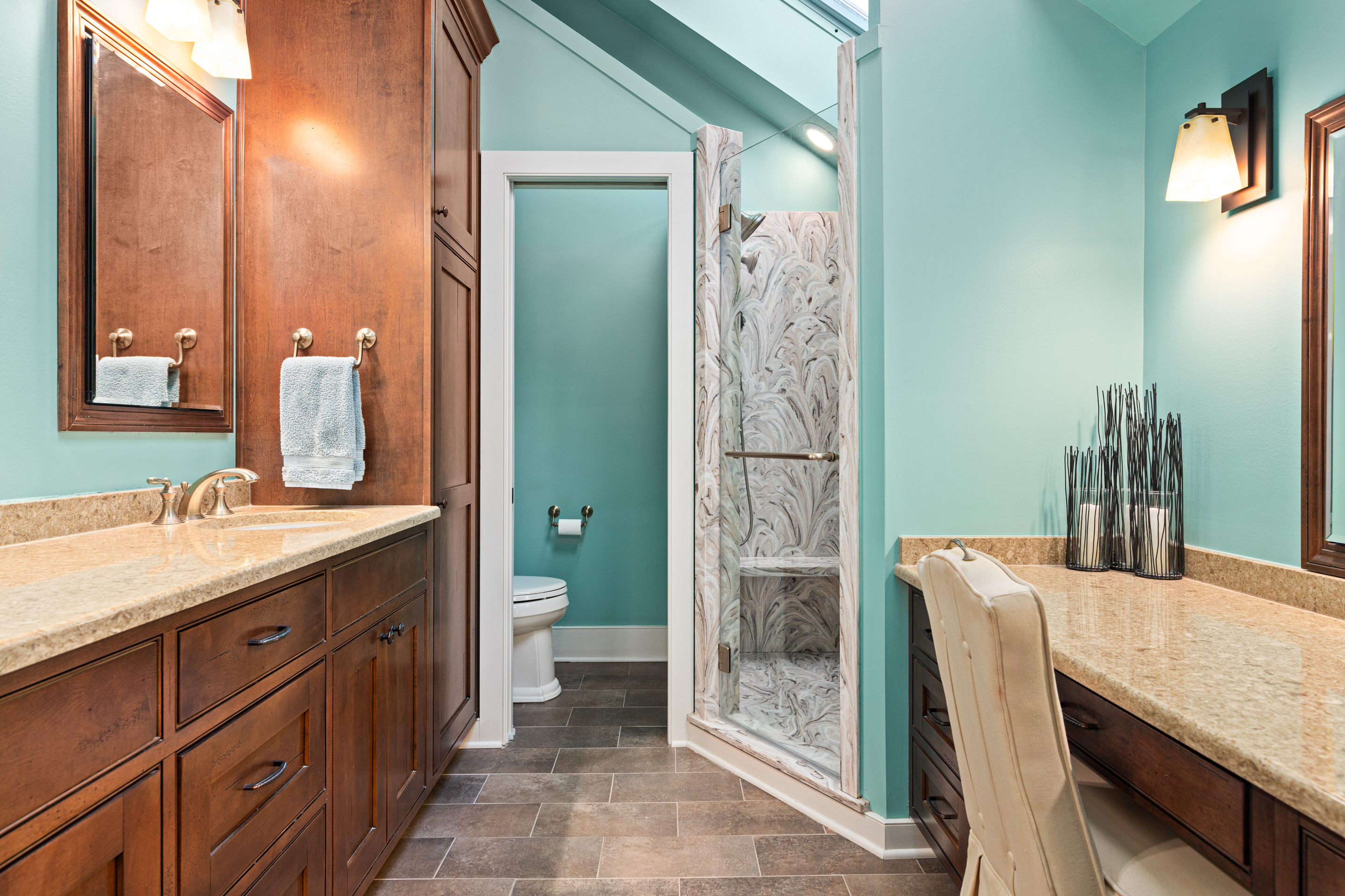 791 Grubbs Mill Road Berwyn, PA 19312 - Photo 32 of 76 a bathroom with a granite countertop sink a mirror and a shower