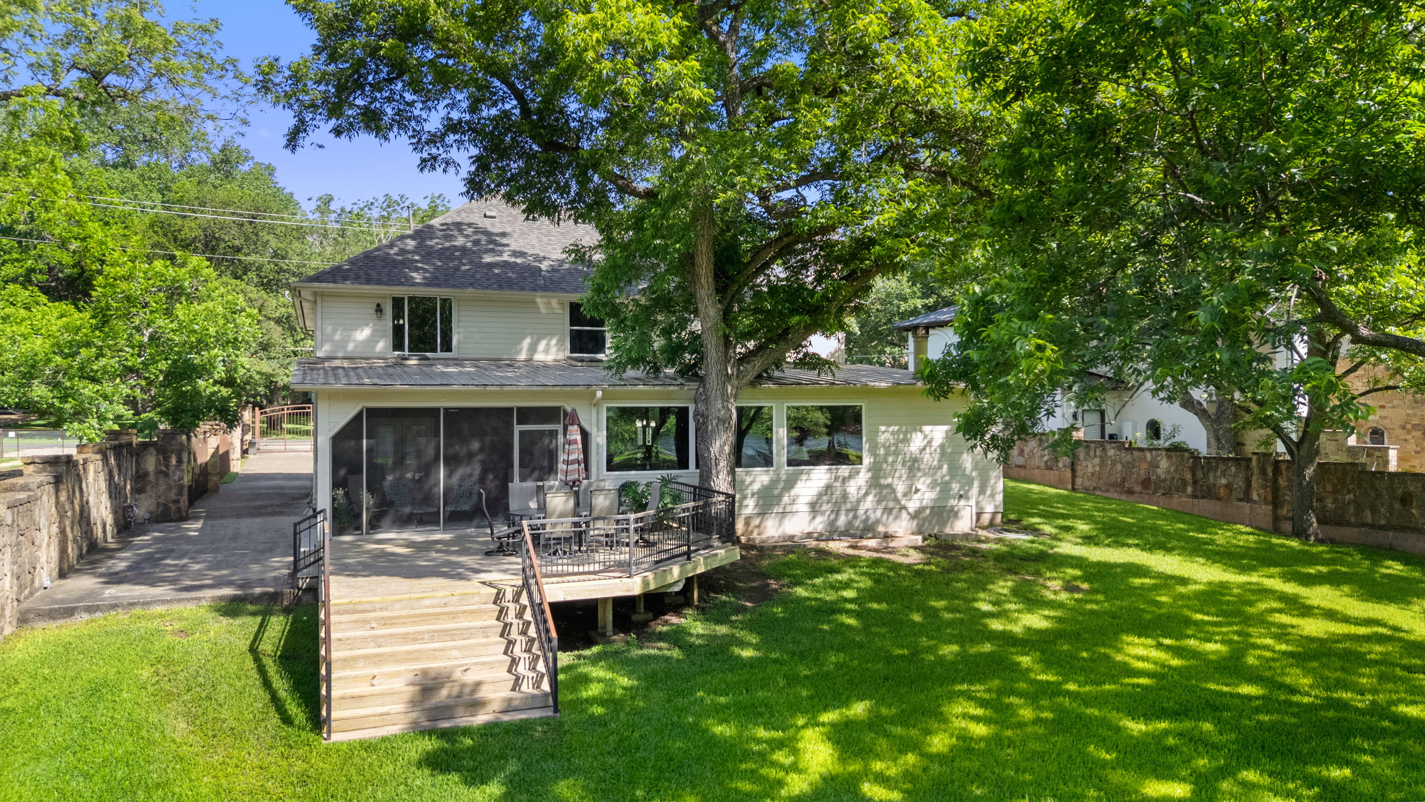 2603 Pearce Road Austin, TX 78730 - Photo 23 of 41 a front view of a house with garden