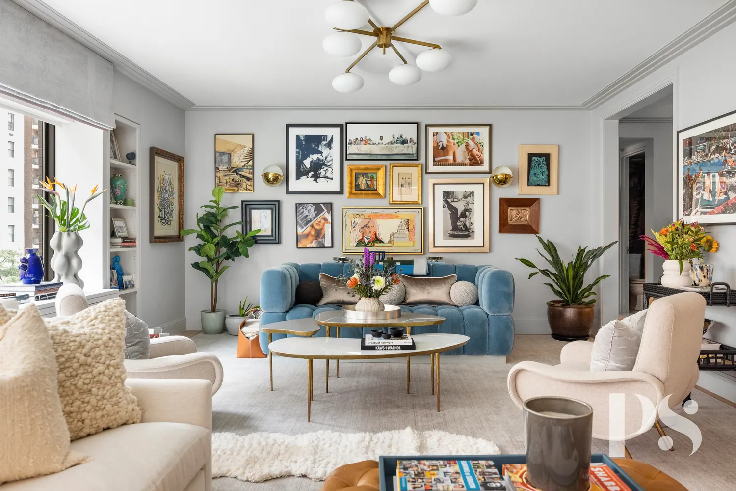 a living room with furniture potted plant and window