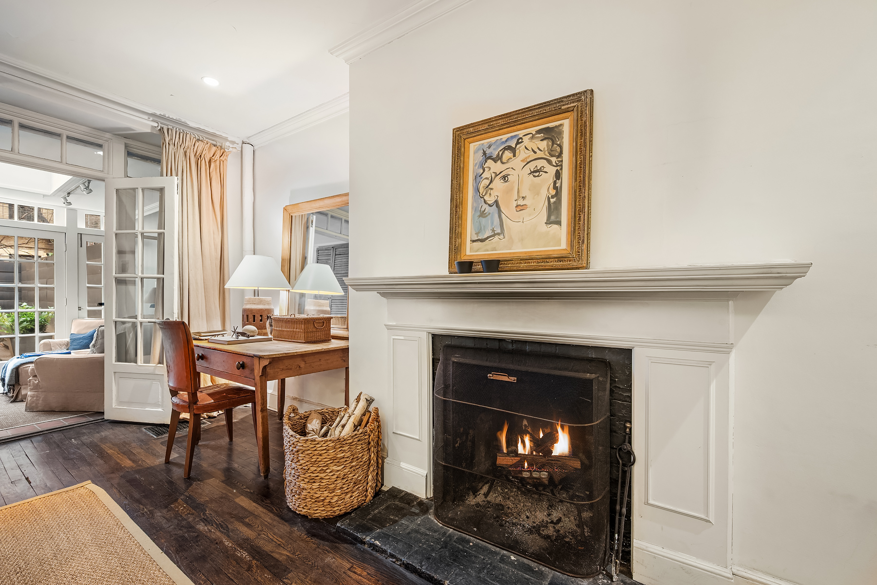 64 East 80th Street Manhattan, NY 10075 - Photo 3 of 14 a living room with furniture and a fireplace