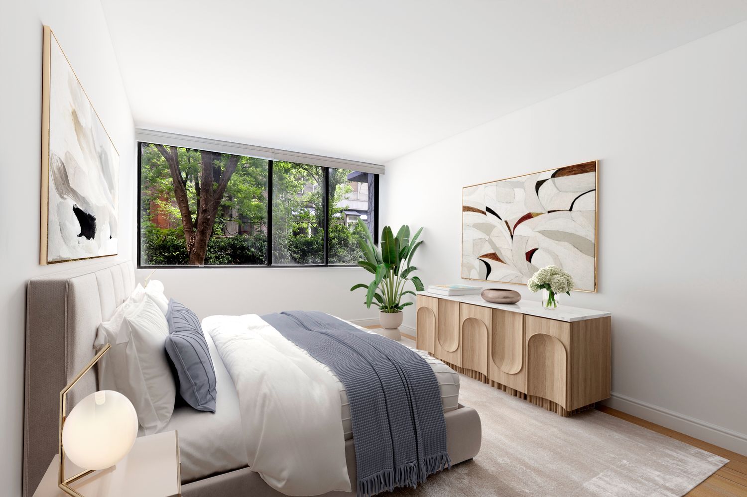 344 West 23rd Street, Unit 1E Manhattan, NY 10011 - Photo 7 of 19 a bedroom with a large bed and a window