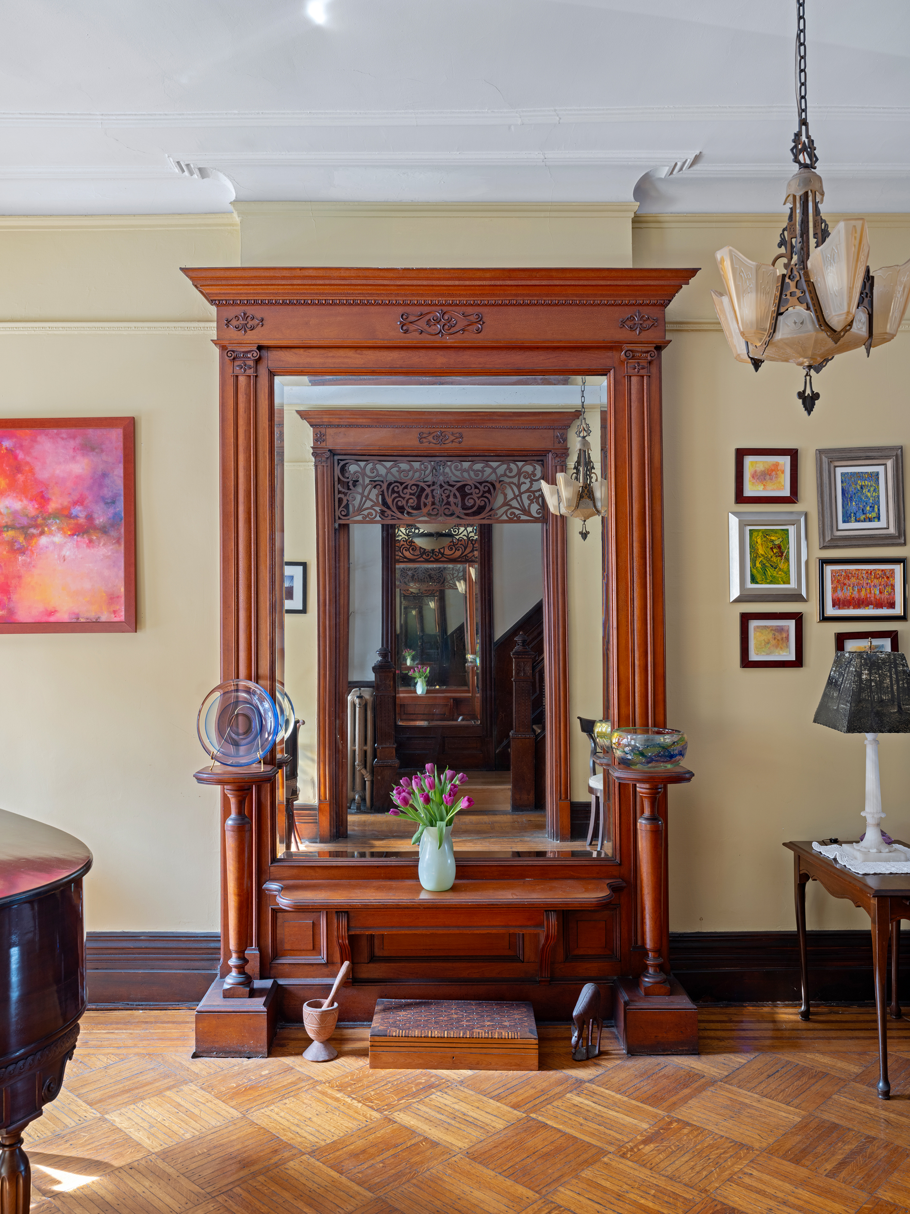 291 Sterling Place Brooklyn, NY 11238 - Photo 11 of 19 a living room with furniture a window and a chandelier