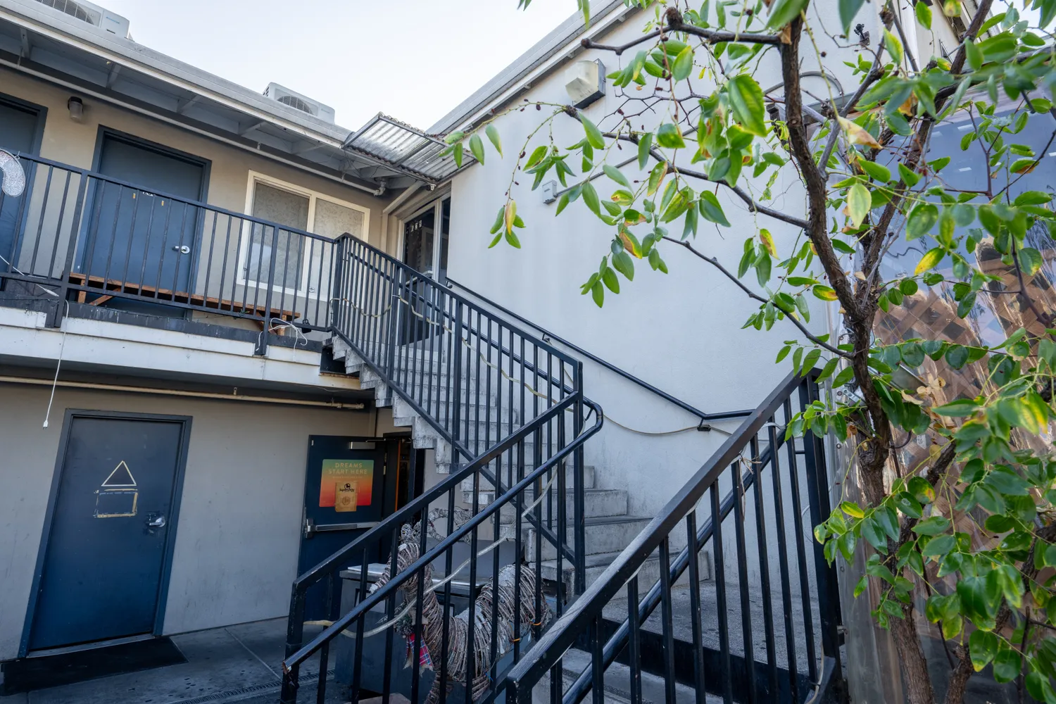 a view of entryway with wooden stairs