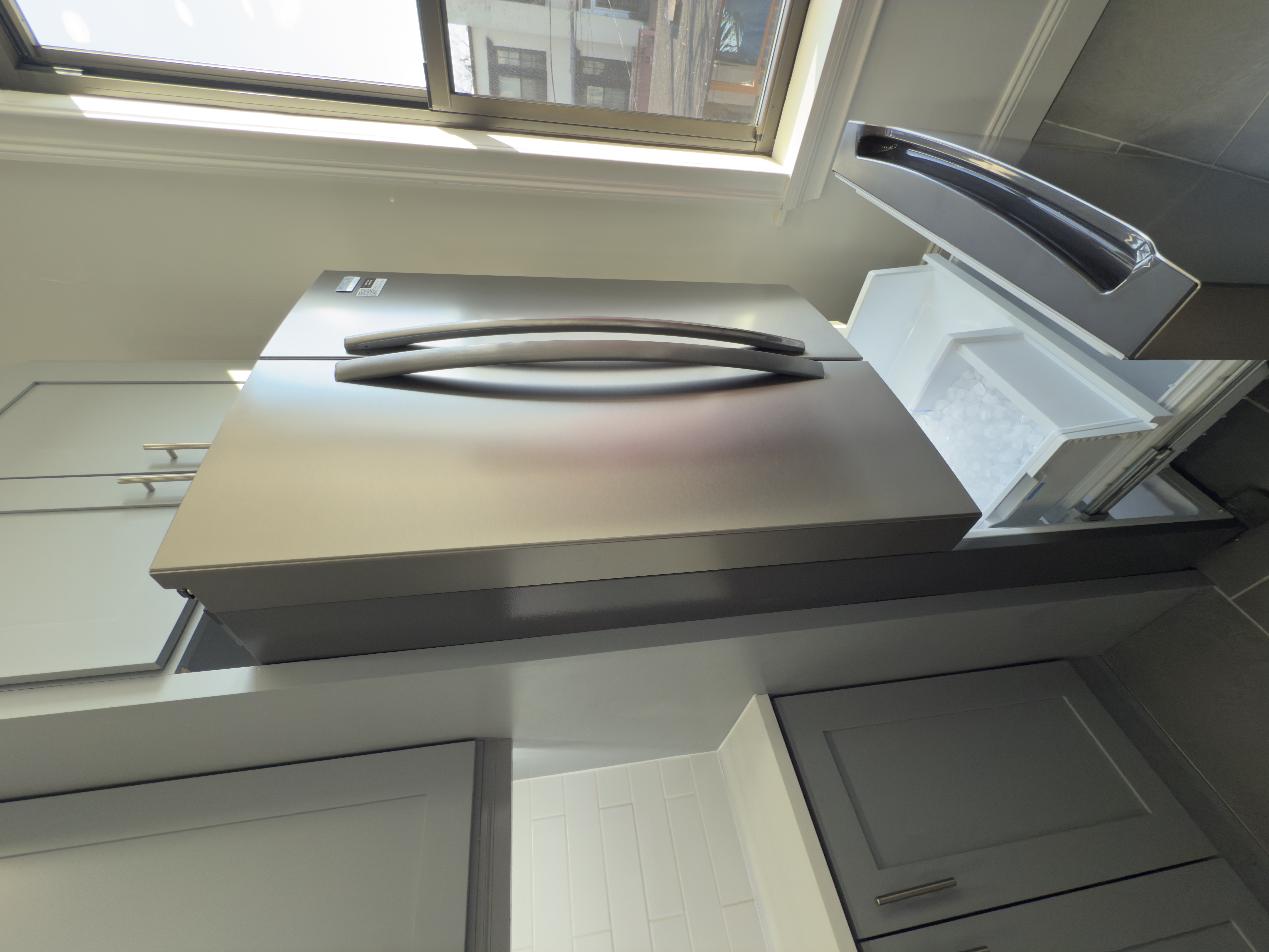 82 74th Street Brooklyn, NY 11209 - Photo 6 of 21 a view of a hallway with furniture and a window