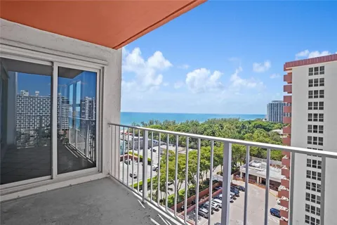 a view of a balcony with city view