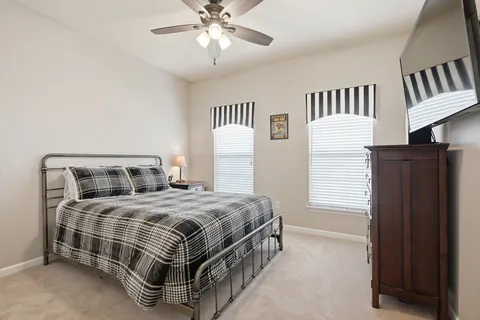 a bathroom with a double vanity sink and mirror