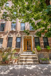 front view of a house with a small yard
