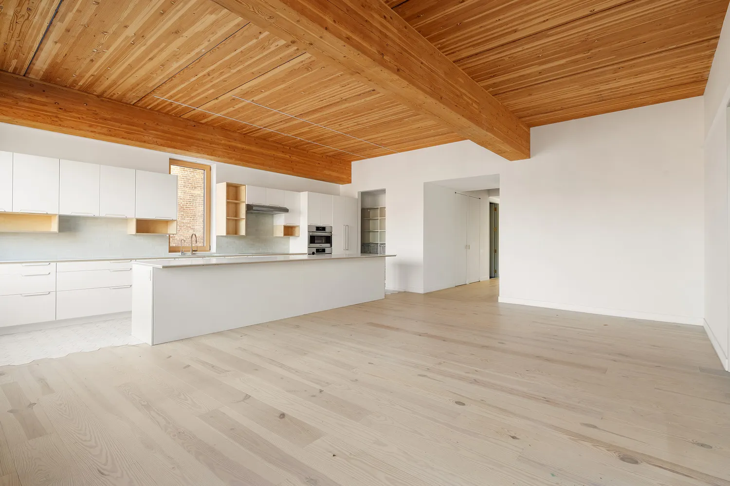 a view of livingroom with kitchen