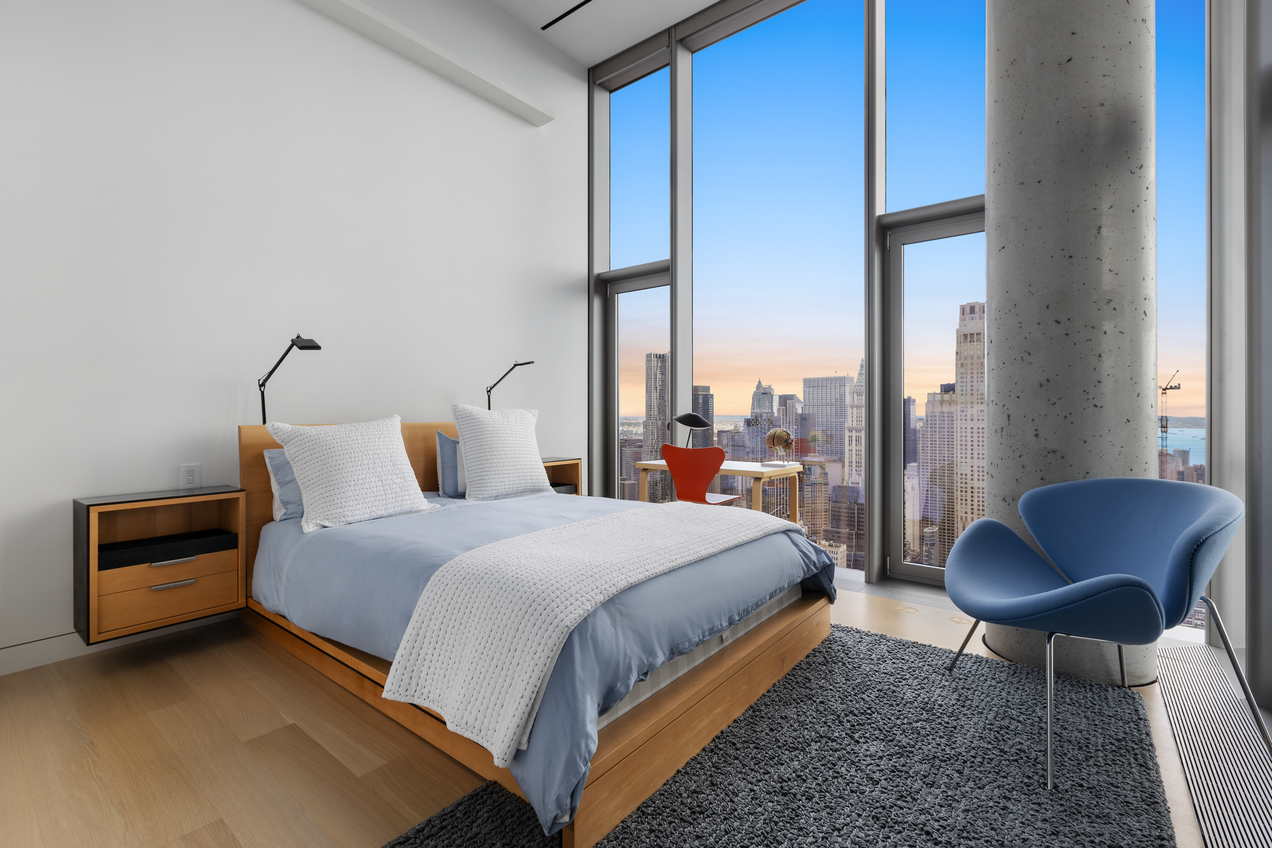 56 Leonard Street, Unit PH52A Manhattan, NY 10013 - Photo 16 of 24 a bedroom with a bed and a window