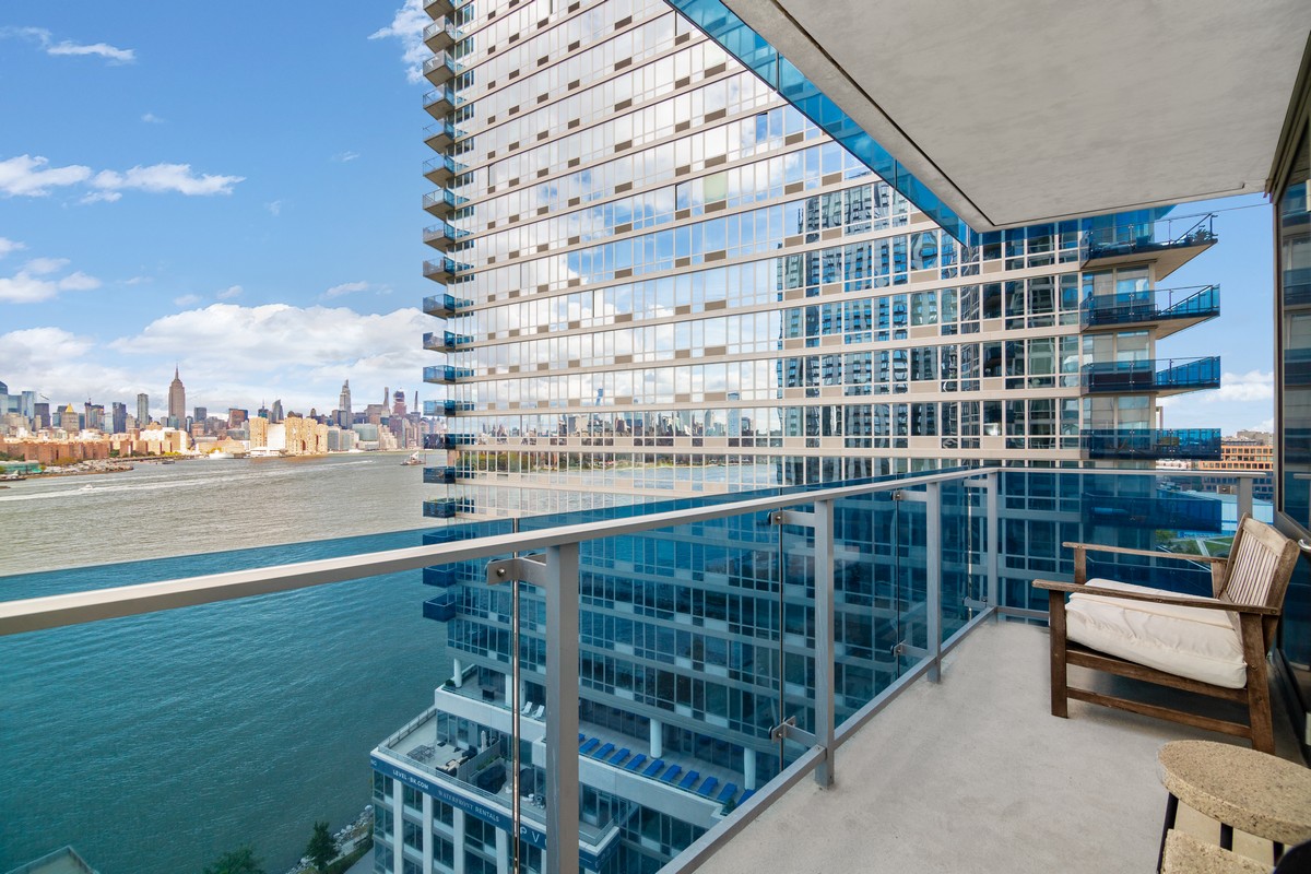 22 North 6th Street, Unit 18D Brooklyn, NY 11249 - Photo 1 of 9 a view of a balcony with a patio