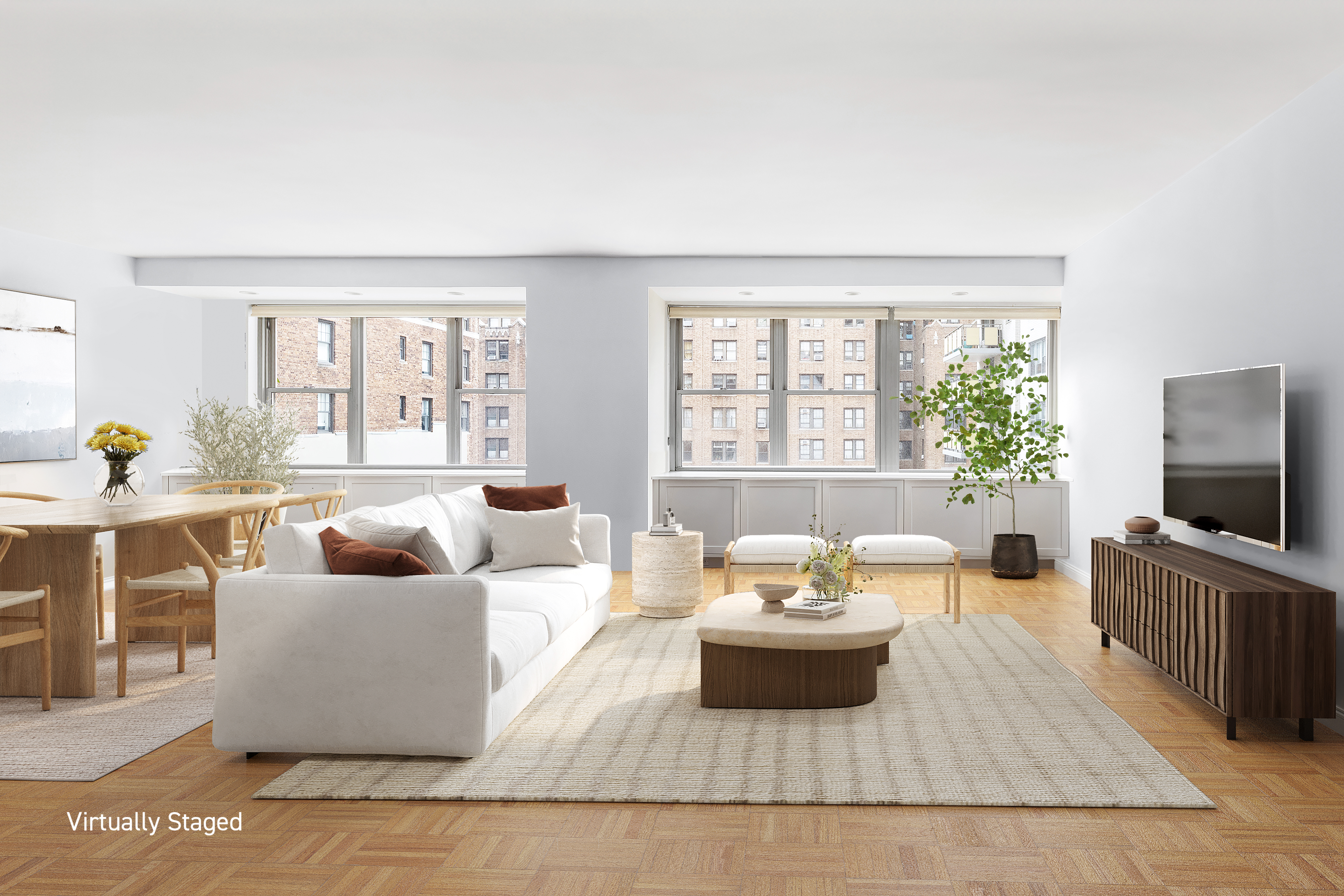15 West 72nd Street, Unit 8TU Manhattan, NY 10023 - Photo 3 of 12 a living room with furniture and a flat screen tv