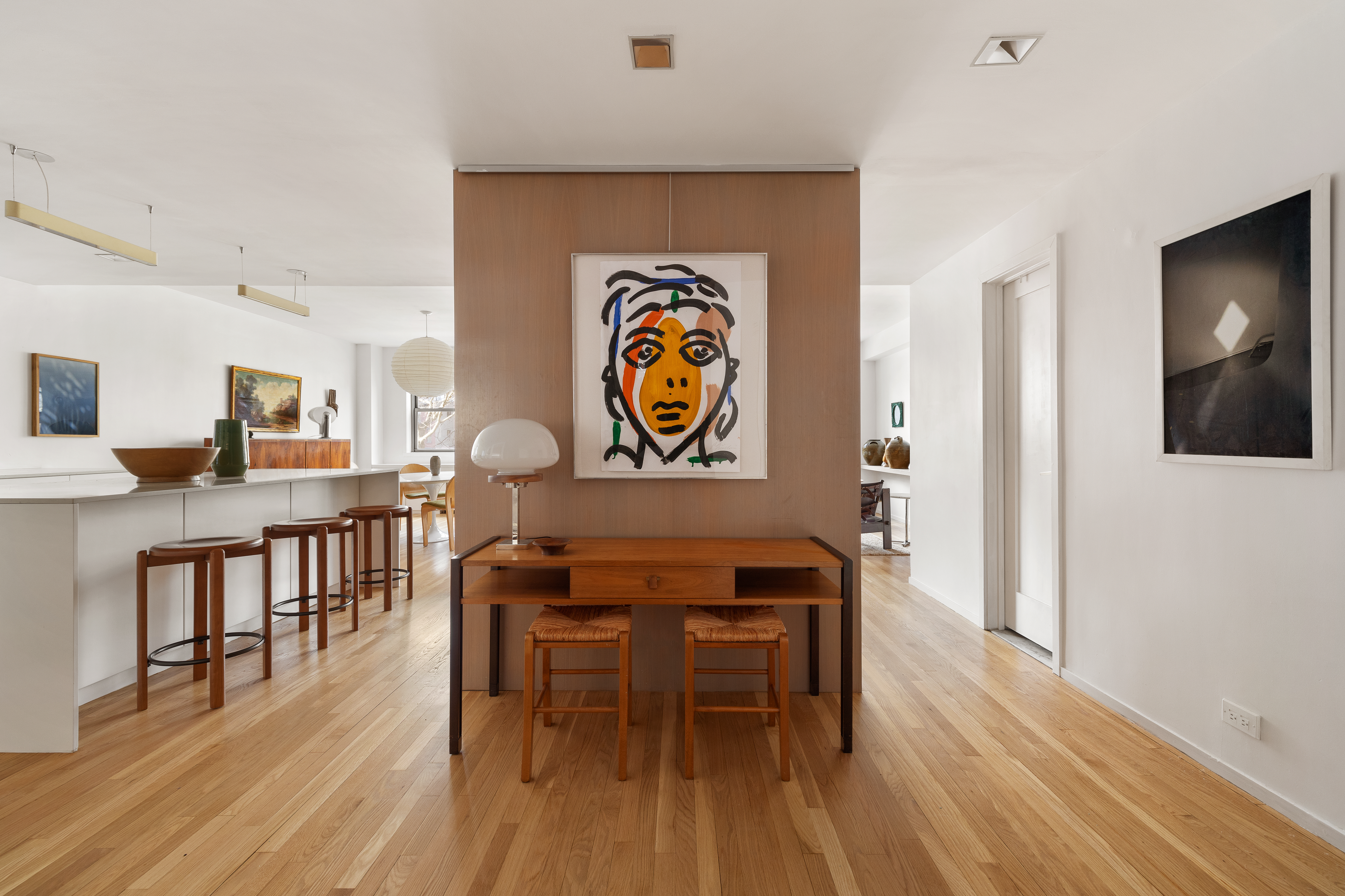 2 Horatio Street, Unit 2PR Manhattan, NY 10014 - Photo 6 of 14 a view of a dining room with furniture and wooden floor