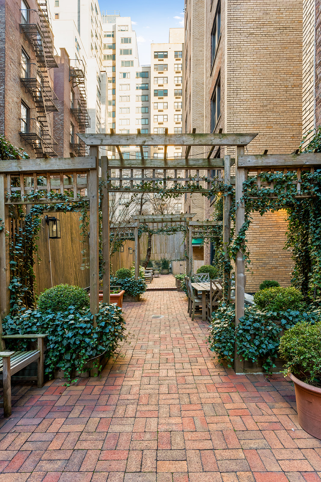 151 East 83rd Street, Unit PHC Manhattan, NY 10028 - Photo 14 of 16 a view of a brick building next to a lake