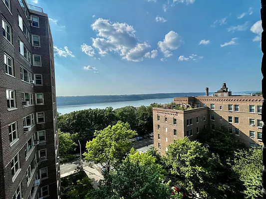 900 West 190th Street, Unit 9B Manhattan, NY 10040 - Photo 4 of 16 a view of a house with yard and garage