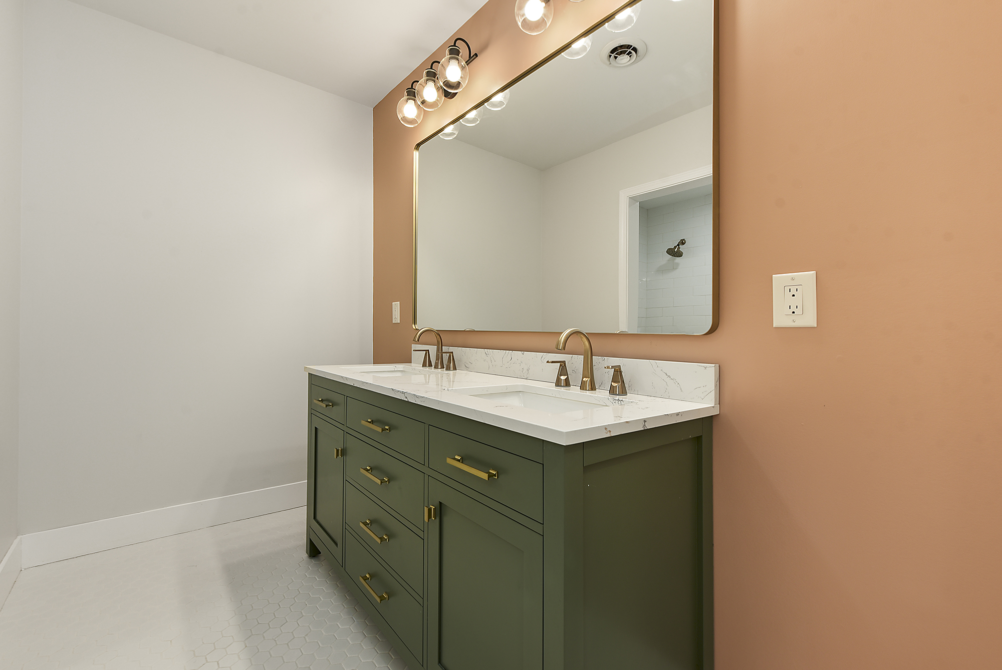 5412 Carnegie Street Pittsburgh, PA 15201 - Photo 31 of 55 a bathroom with a sink and mirror
