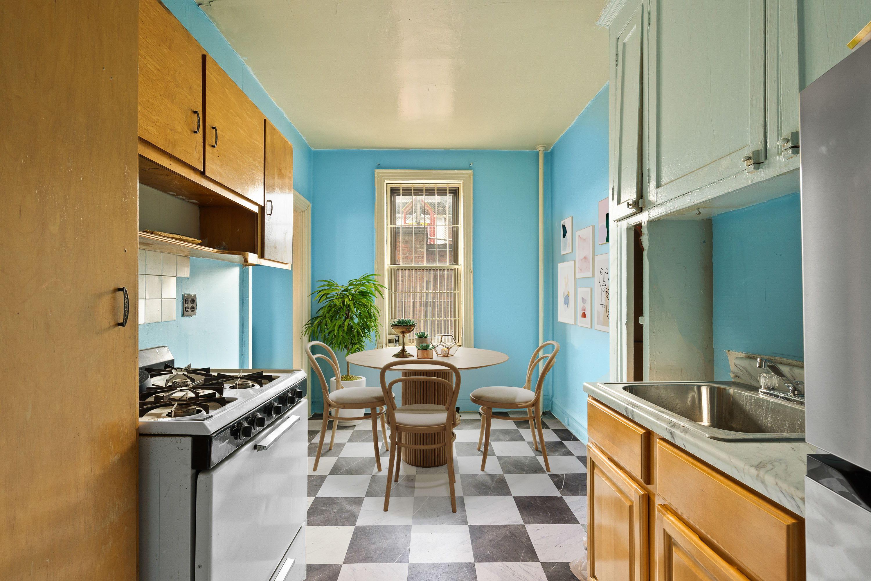 345 Montgomery Street, Unit 3C Brooklyn, NY 11225 - Photo 7 of 17 a kitchen with a stove a sink and a refrigerator