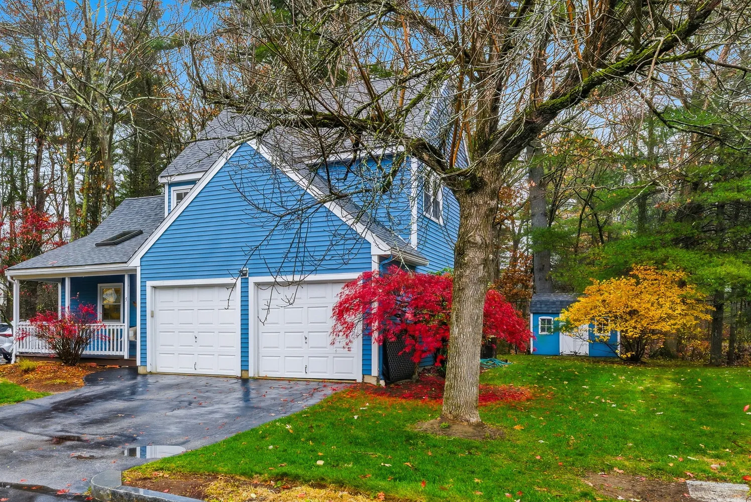 a front view of house with yard and entertaining space