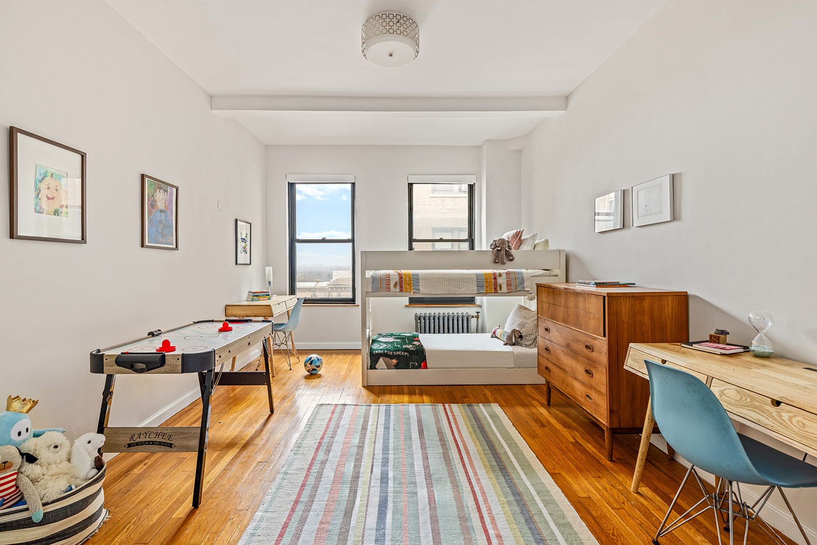 135 Eastern Parkway, Unit 13E Brooklyn, NY 11238 - Photo 10 of 15 a living room with furniture and wooden floor