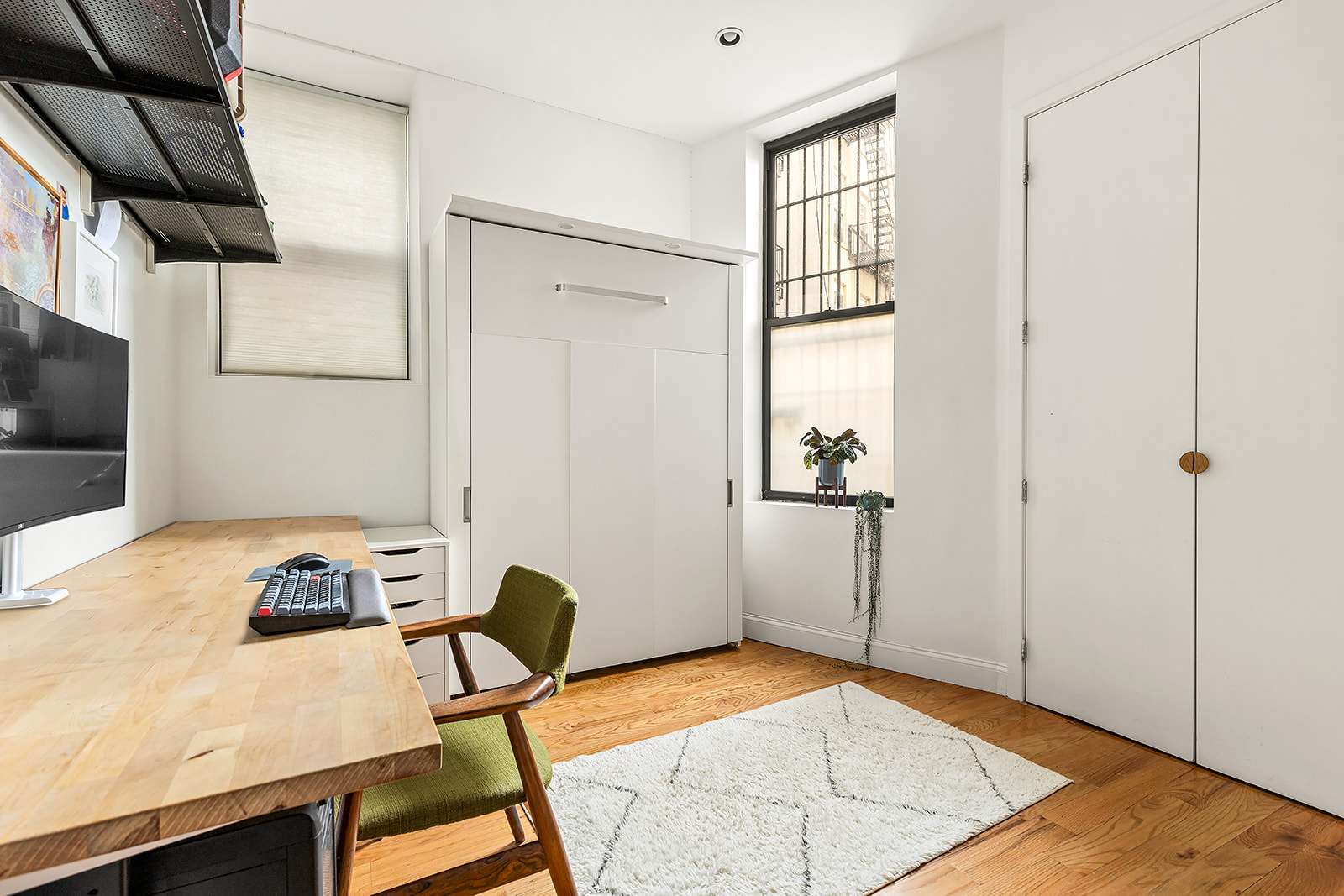 1153 Pacific Street, Unit 1 Brooklyn, NY 11216 - Photo 6 of 11 a workspace with furniture and window