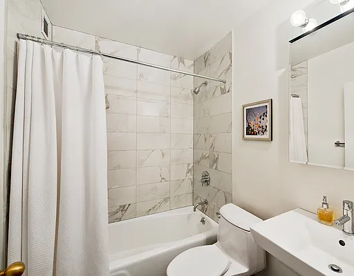 280 Park Avenue South, Unit 7A Manhattan, NY 10010 - Photo 7 of 13 a bathroom with a sink and a toilet