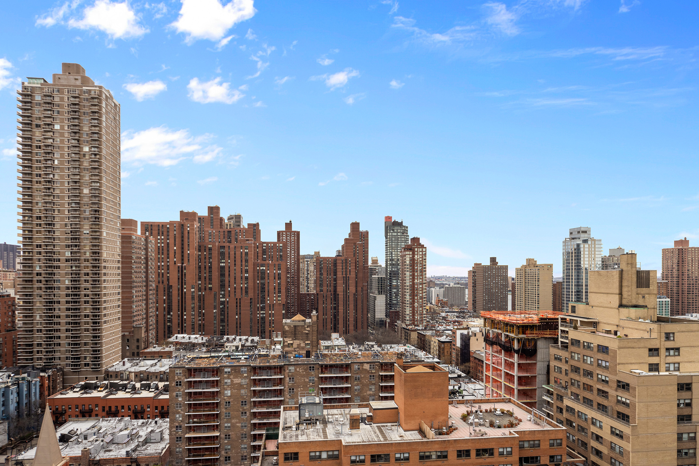 233 East 86th Street, Unit PHB Manhattan, NY 10028 - Photo 10 of 12 a view of a city with tall buildings