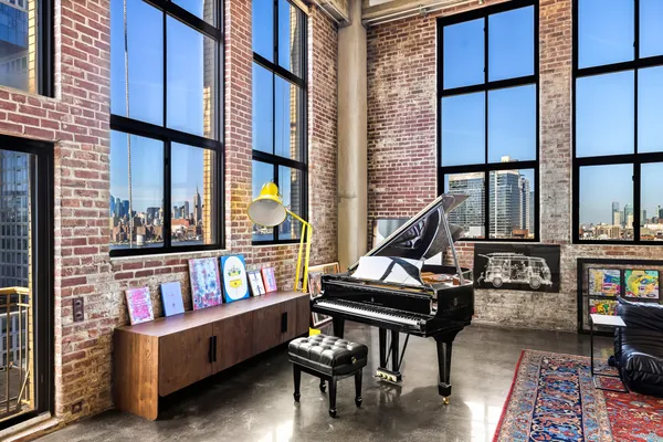 a reading room with furniture and a window