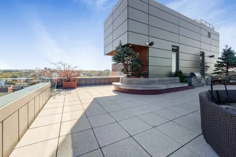 a view of terrace with seating space and stairs