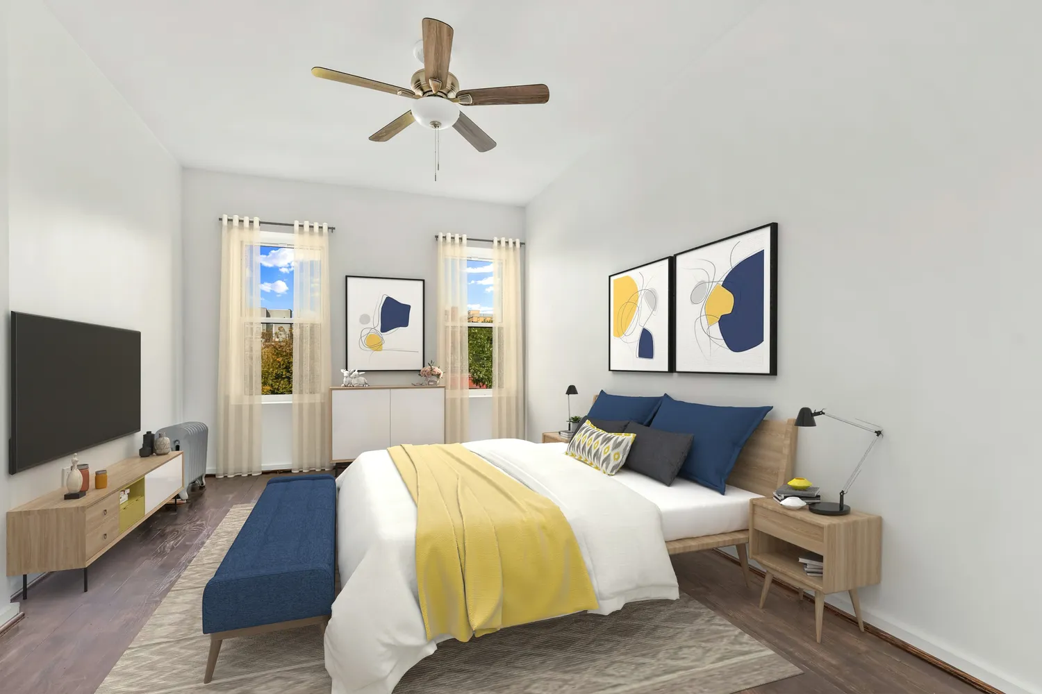 a bedroom with a bed and a flat screen tv