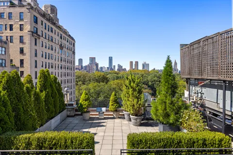 a view of a city with tall buildings