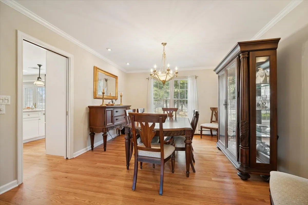 a living room with furniture fireplace and flat screen tv