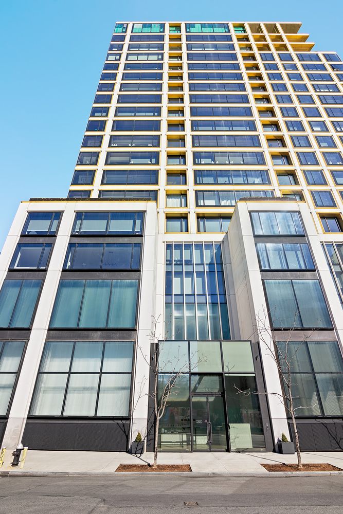 551 West 21st Street, Unit 10B Manhattan, NY 10011 - Photo 21 of 22 a front view of a multi story building