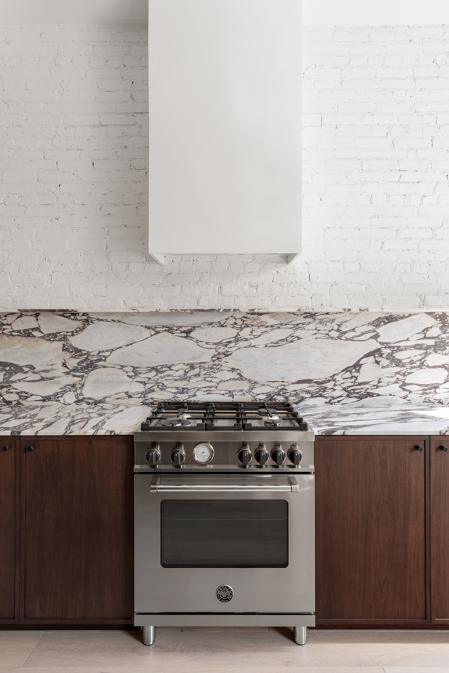 114 A Hart Street Brooklyn, NY 11206 - Photo 3 of 24 a stove top oven sitting inside of a kitchen