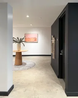 a vase of flowers sitting on a table